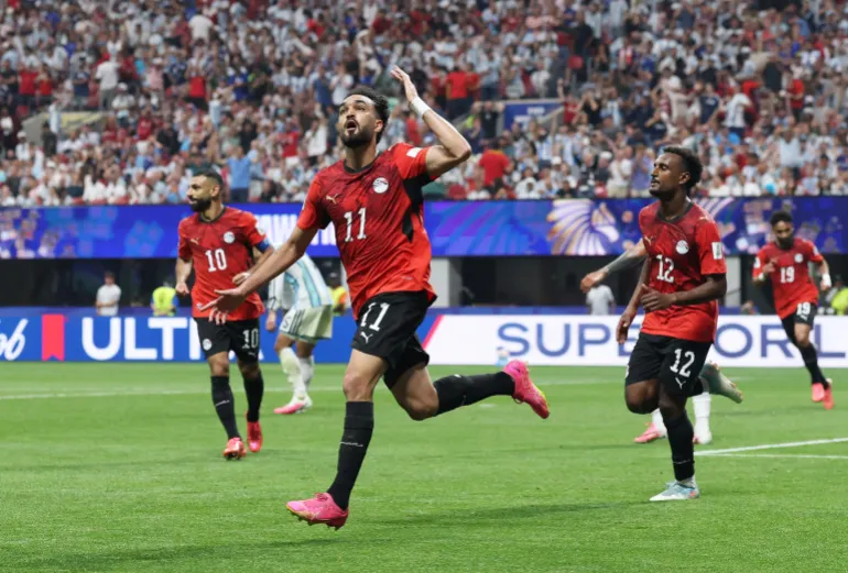 সকার ফুটবল - ফিফা বিশ্বকাপ 2026 - রাউন্ড অফ 16 - আর্জেন্টিনা বনাম মিশর - আটলান্টা স্টেডিয়াম, আটলান্টা, জর্জিয়া, ইউএস - 7 জুলাই, 2026 মিশরের মোস্তফা জিকো তাদের দ্বিতীয় গোল করে উদযাপন করছে REUTERS/Paul Childs